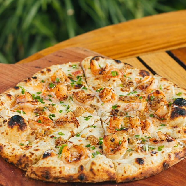 Shrimp Alfredo Pizza.